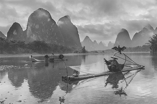 woman riding on boat on pond