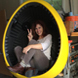 Dene Grigar in the CMDC's Sound Egg Chair